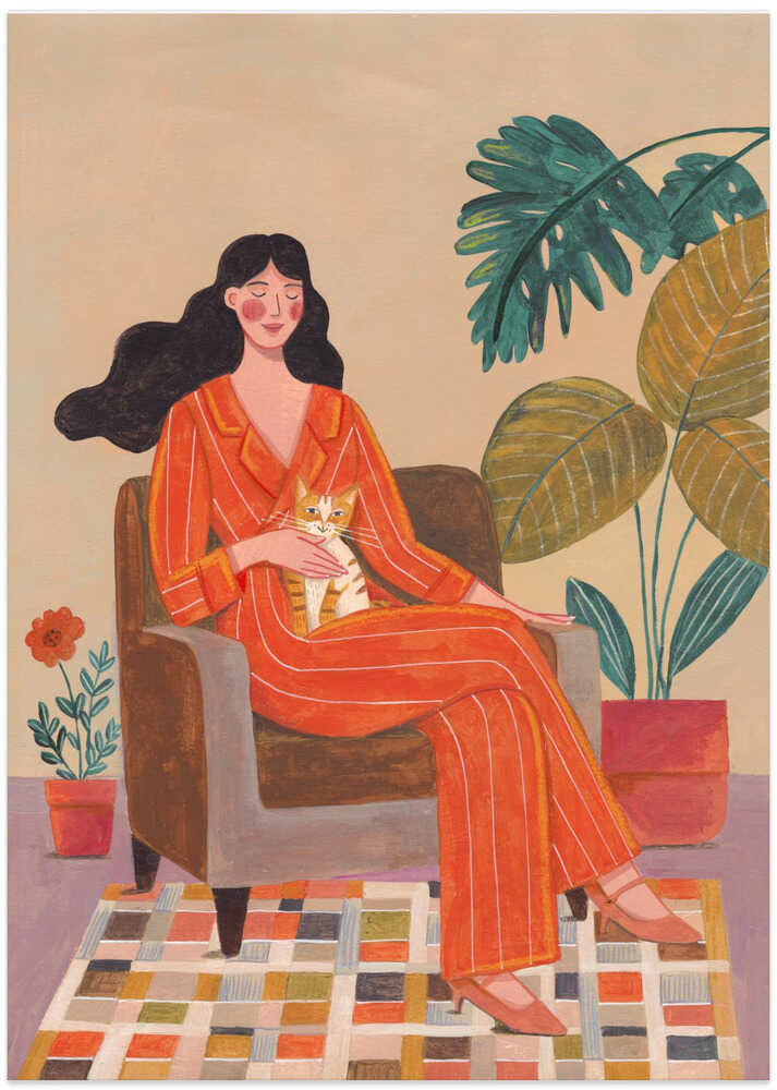 Woman with cat in living room with warm earth tones by Caroline Bonne Müller
